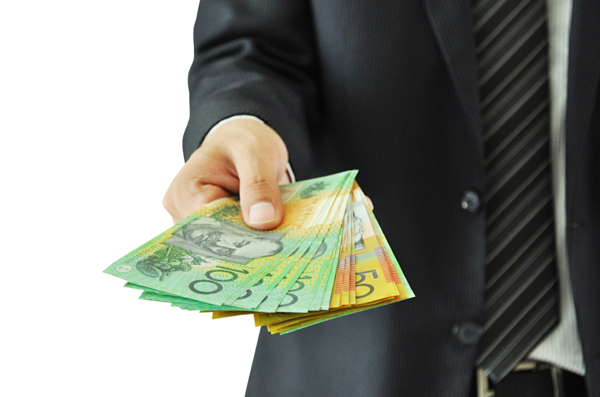 Businessman giving money - Australian dollars