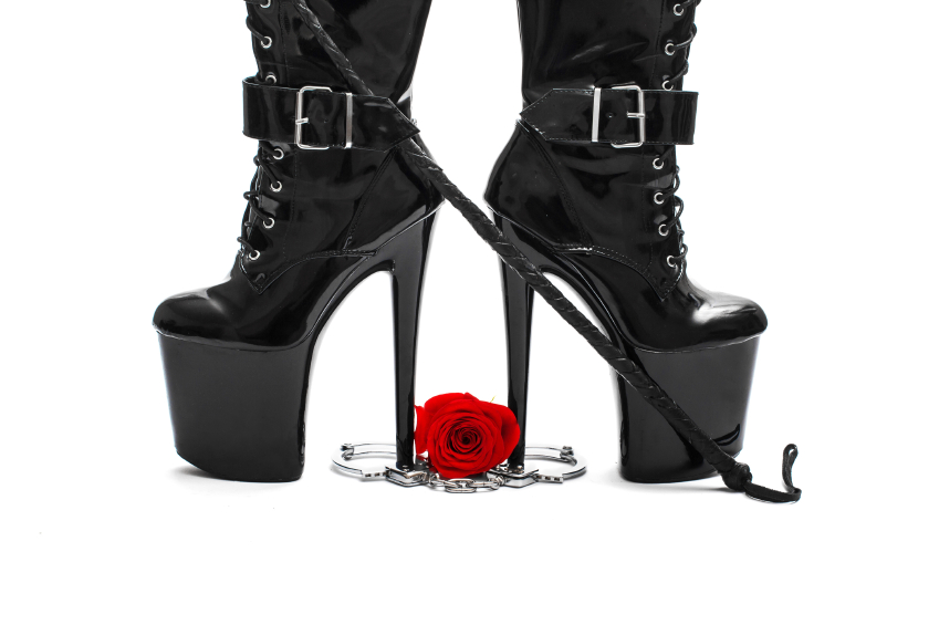 High heel boots with whip, rose and handcuffs